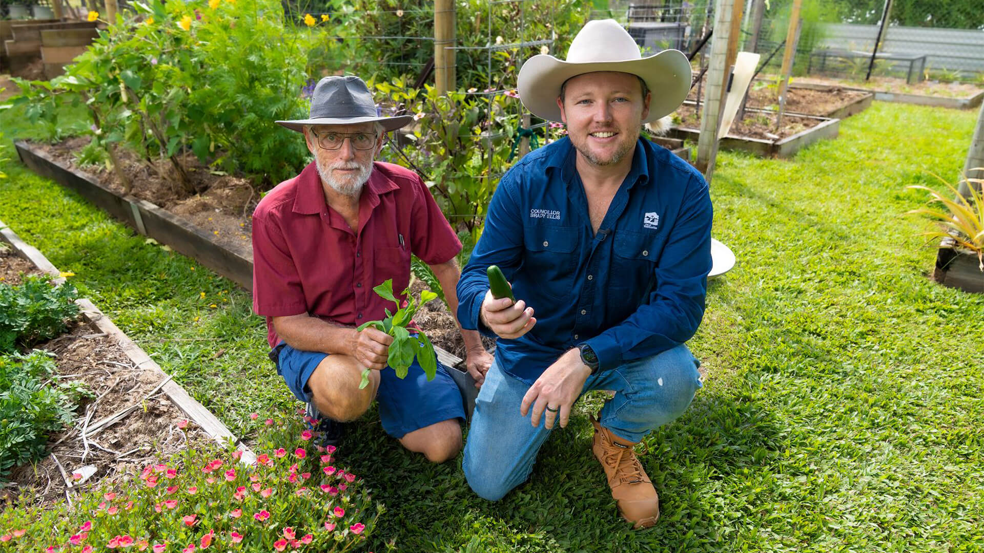 Townsville Community Garden secretary John Eckersley with Councillor Brady Ellis