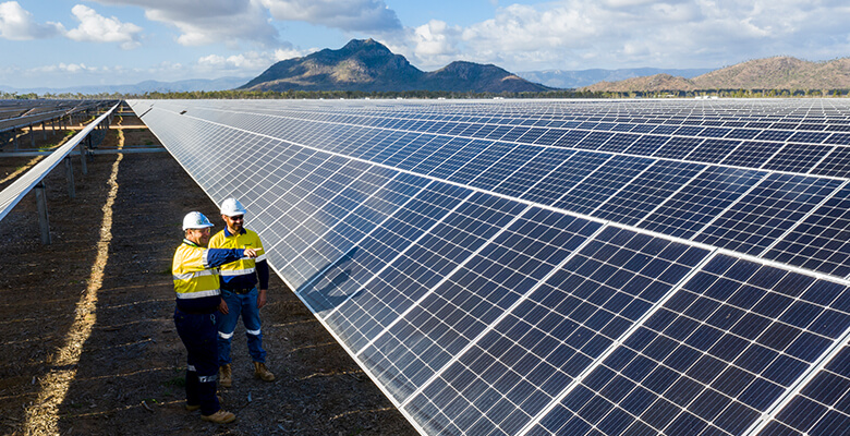 Caption: Four companies have signed on to establish themselves at Lansdown. Picture: Roslyn Budd – Budd Photography Two men standing by a solar farm