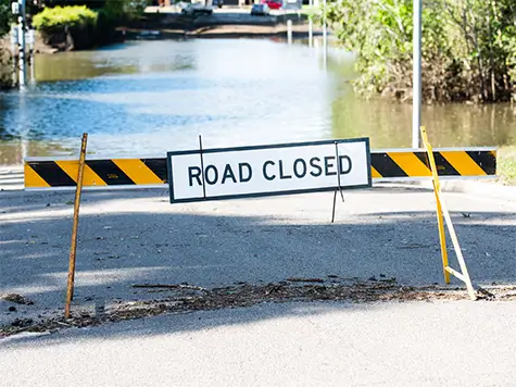 A road that is closed because it is flooded