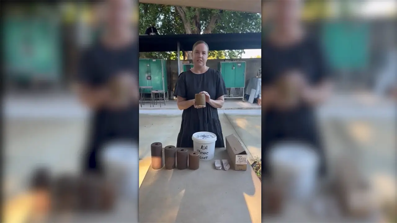 Natalie Ward with her artwork