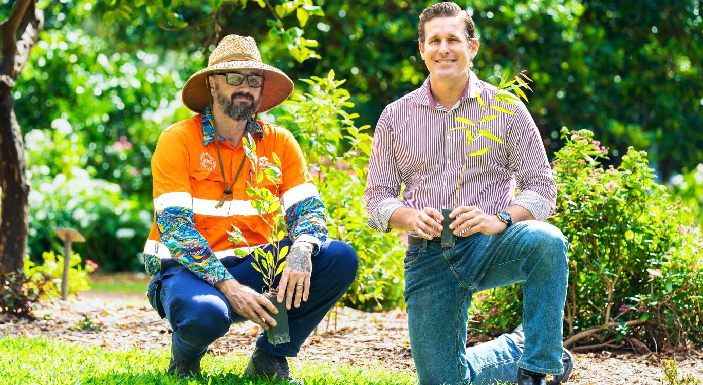 Council nursery gardener Joshua Draper and Cr Kurt Rehbein with two of the 700 saplings ready to be planted at Mount Louisa this National Tree Day.