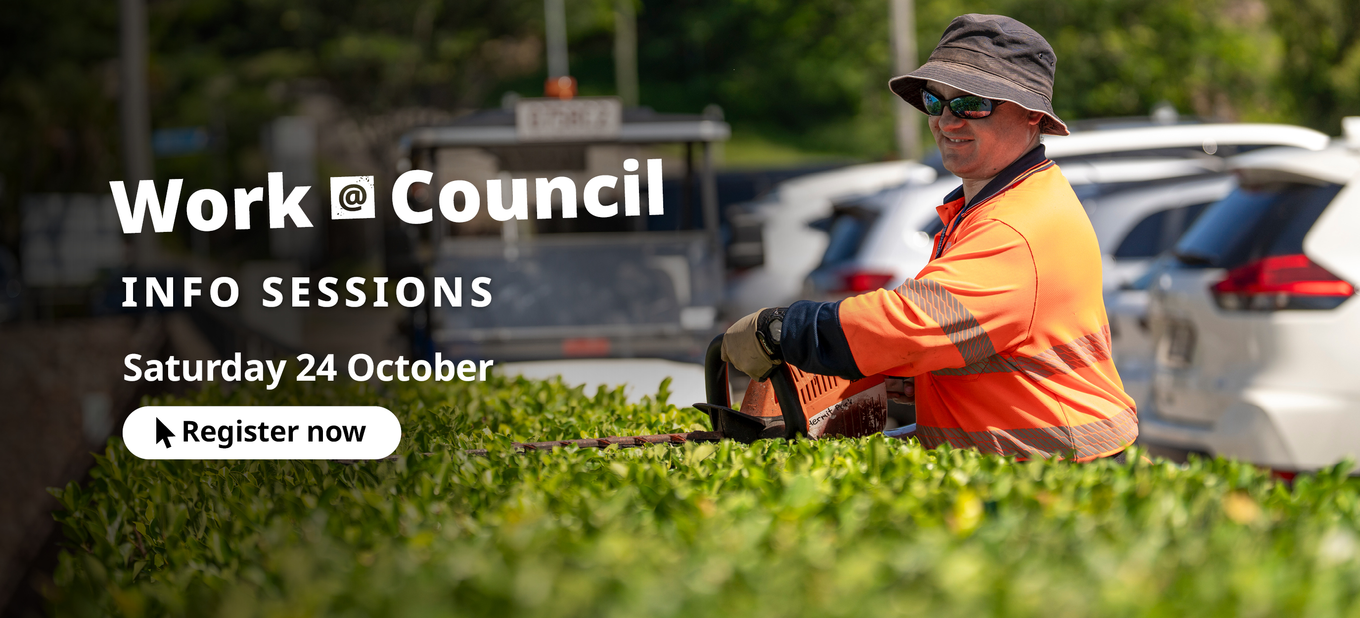 Council worker trimming hedge