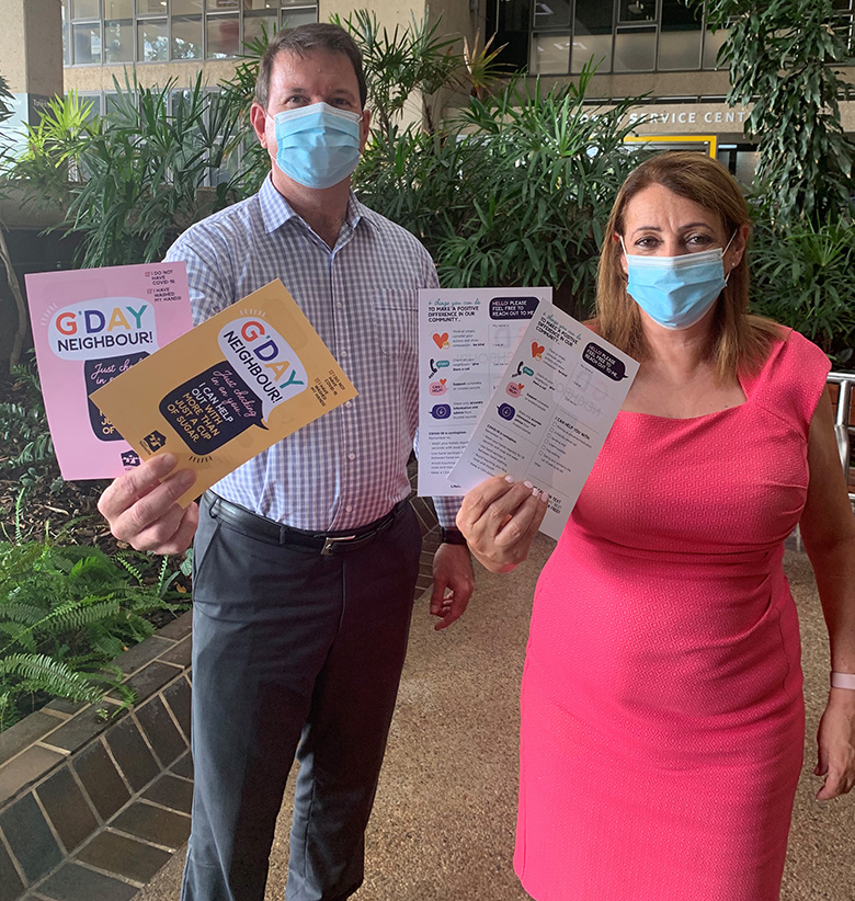 THHS CEO Kieran Keyes and Townsville Mayor Jenny Hill with the G'Day Neighbour postcards