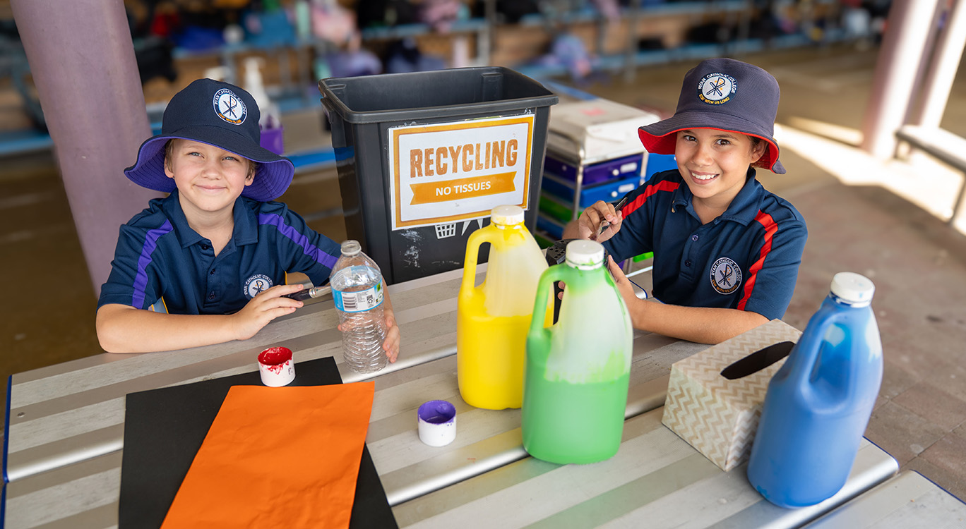 Ryan Catholic College students Darcy and Sienna sorting recycling ahead of the Regional Recycled Art Competition.