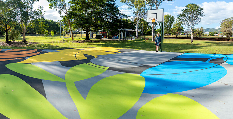 Cr Suzy Batkovic standing on newly refreshed Marabou Park half-court Cr Suzy Batkovic standing on newly refreshed Marabou Park half-court