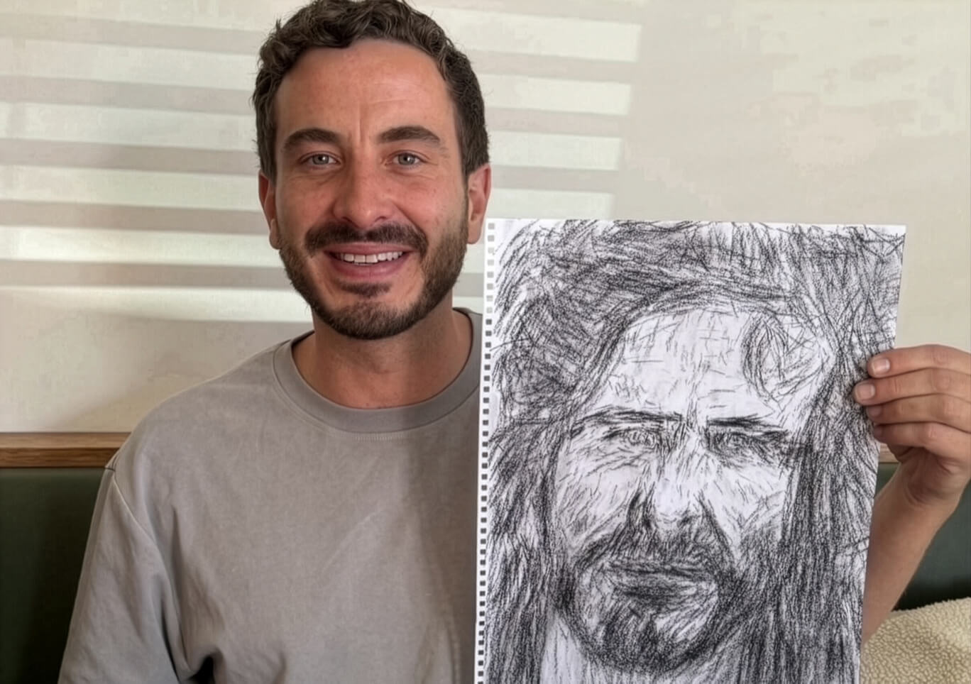 Australian actor Ryan Corr with an early sketch by portrait artist Thomas Delohery