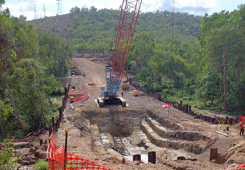 Trench excavation for pipe installation across the upper section of Ross River is underway.