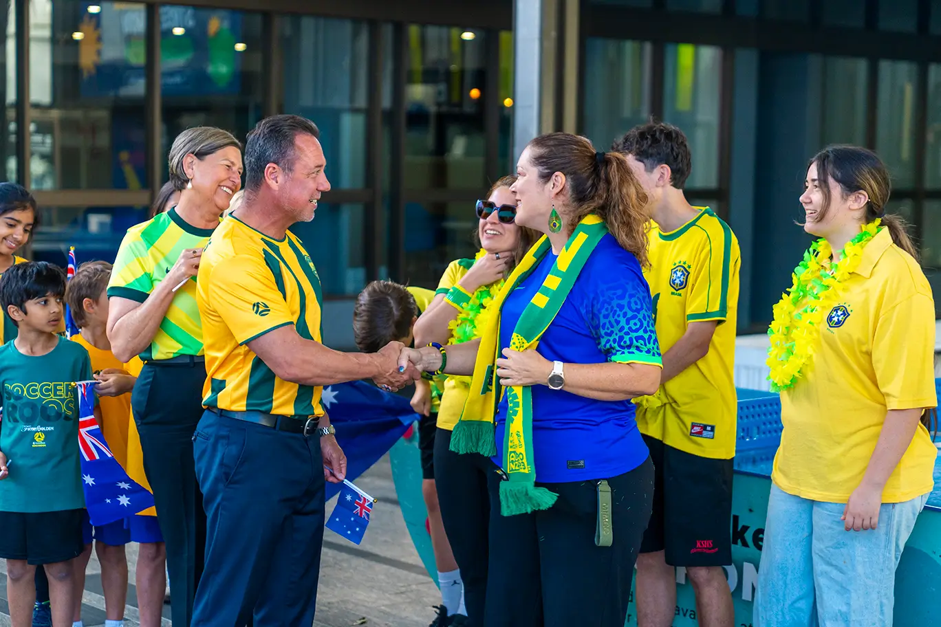 Janelle Poole MP and Mayor Nick Dametto chatting to Brazil supporters
