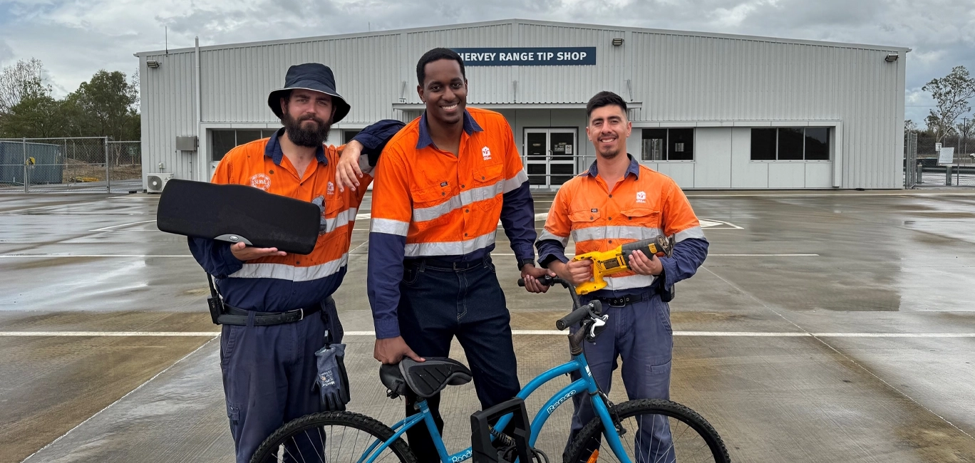 Council’s Resource Recovery team members Michael Rush, Amani Kowero and Ricky Murillo begin to restock the Hervey Range Facility.