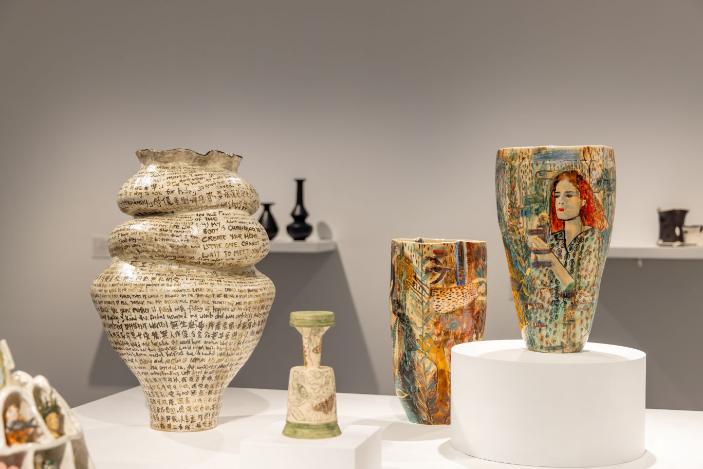 Entries to the 2024 awards, including on the far-left Ruby Yu-Lu Yeh's <i>Motherhood</i>, which won the City of Townsville Art Collection Award.