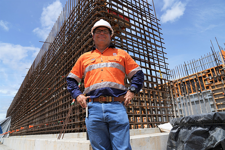 Caption: Cr Russ Cook with the completed foundation. Cr Russ Cook with the completed foundation