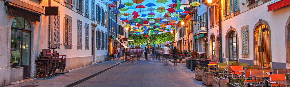 Festoon umbrellas in Rue de Saint-Joseph, Carouge, Geneva, Switzerland.