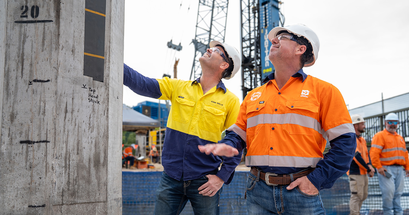 Member for Townsville Adam Baillie MP and Mayor Nick Dametto inspecting piling