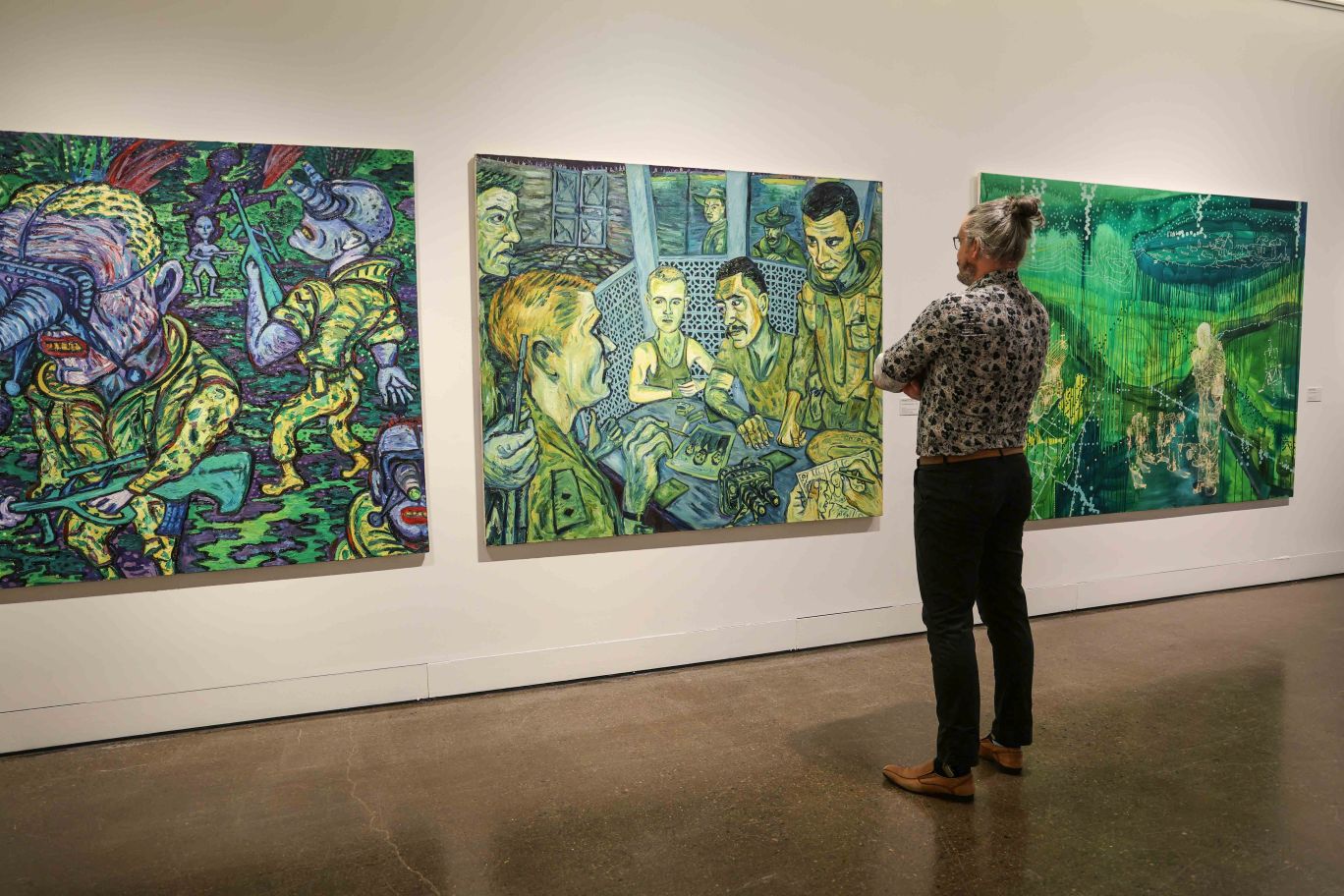 Blake Collis perusing the exhibition