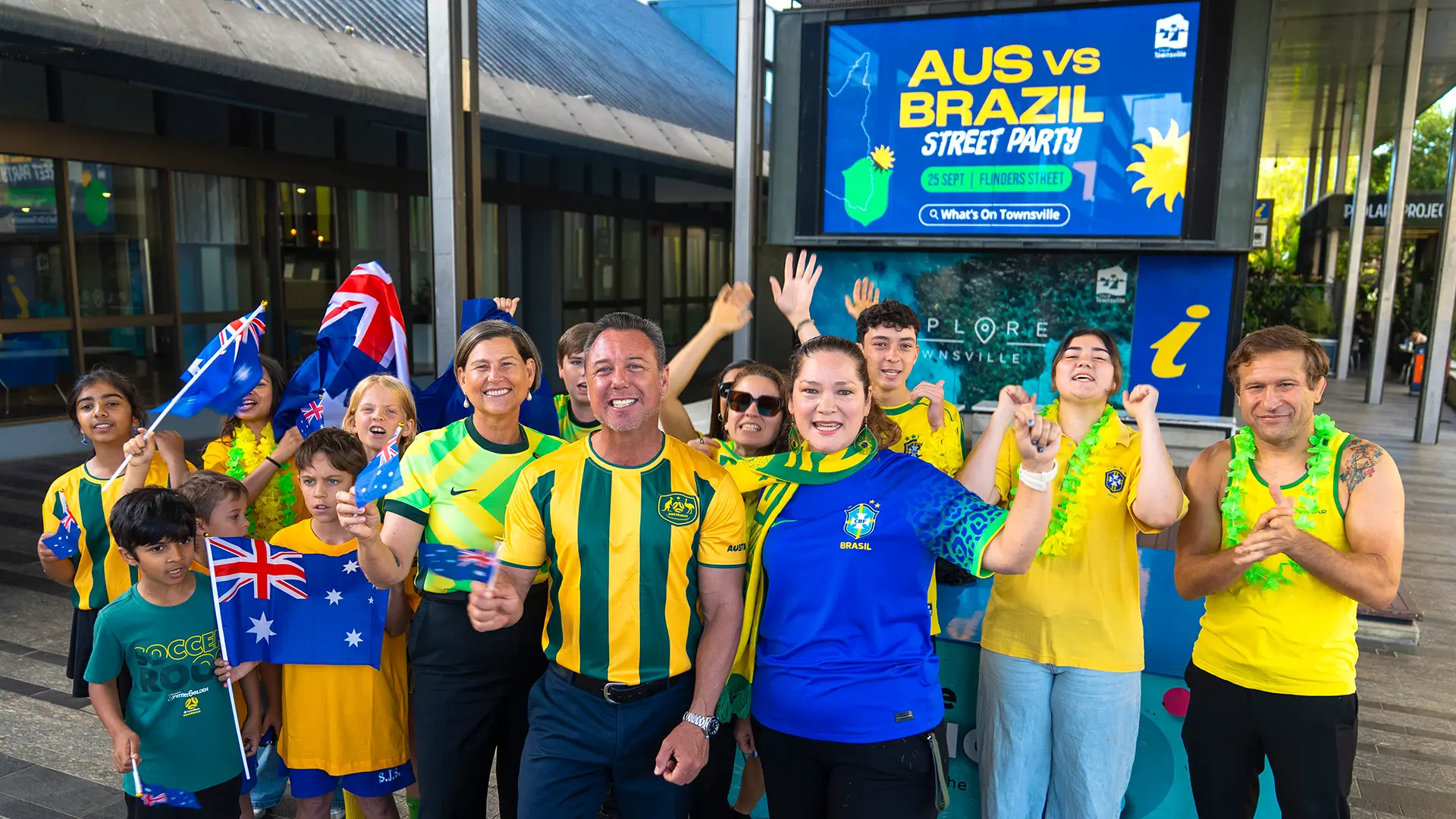 Janelle Poole MP and Mayor Nick Dametto with Australian and Brazil football fanatics