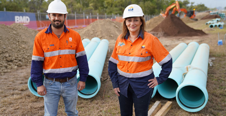 Project Manager Lachlan Campbell and Mayor Jenny Hill visit the site of the Bohle Plains water main construction project. Water Main - Bohle Plains