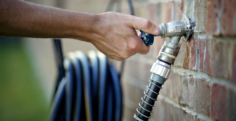 Townsville residents are being urged to turn off their sprinklers following rain in December