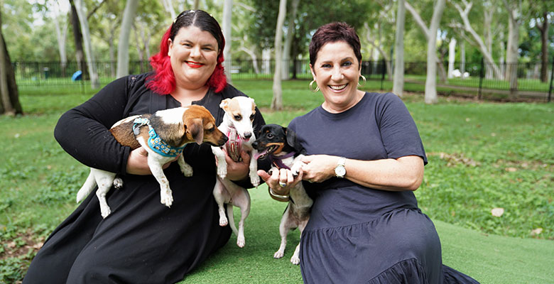 Resident Clair Ryder, pictured with Cr Ann-Maree Greaney and dogs.