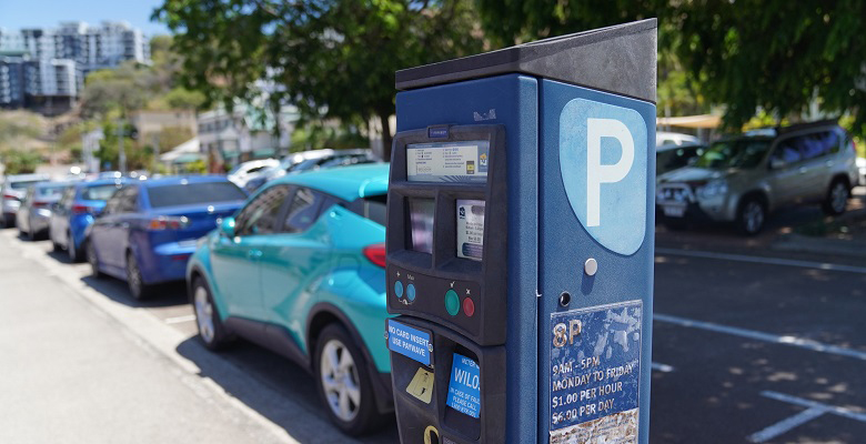 Image of parking meter in street.