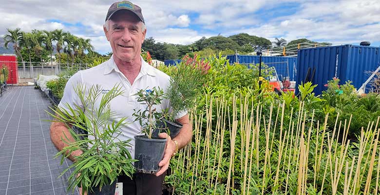 Cr Maurie Soars with some plants grown at Council’s nursery