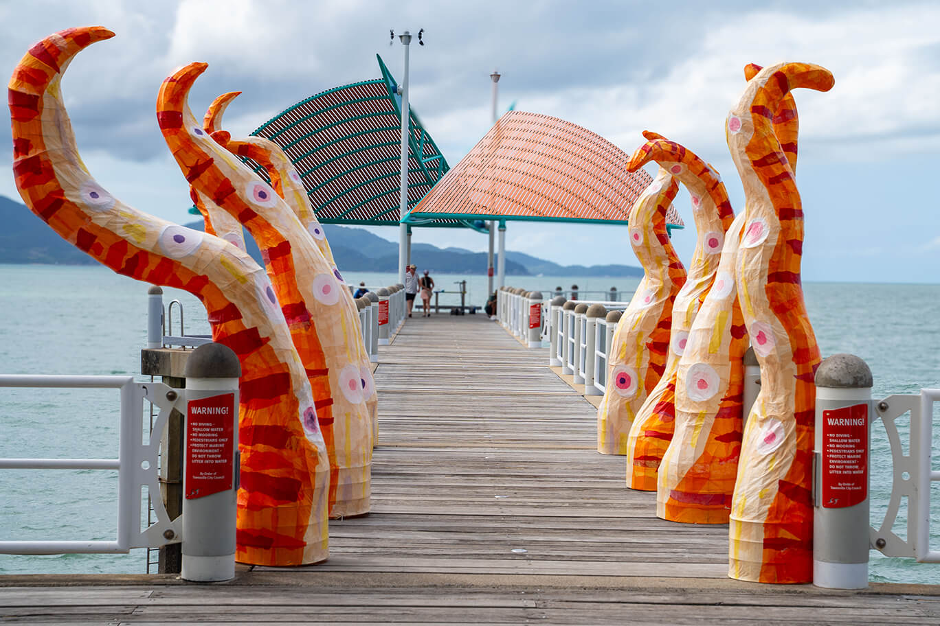 Eight tentacles on the Strand Jetty made of steel rods, paper, cane, LED lighting, and waterproofing agent