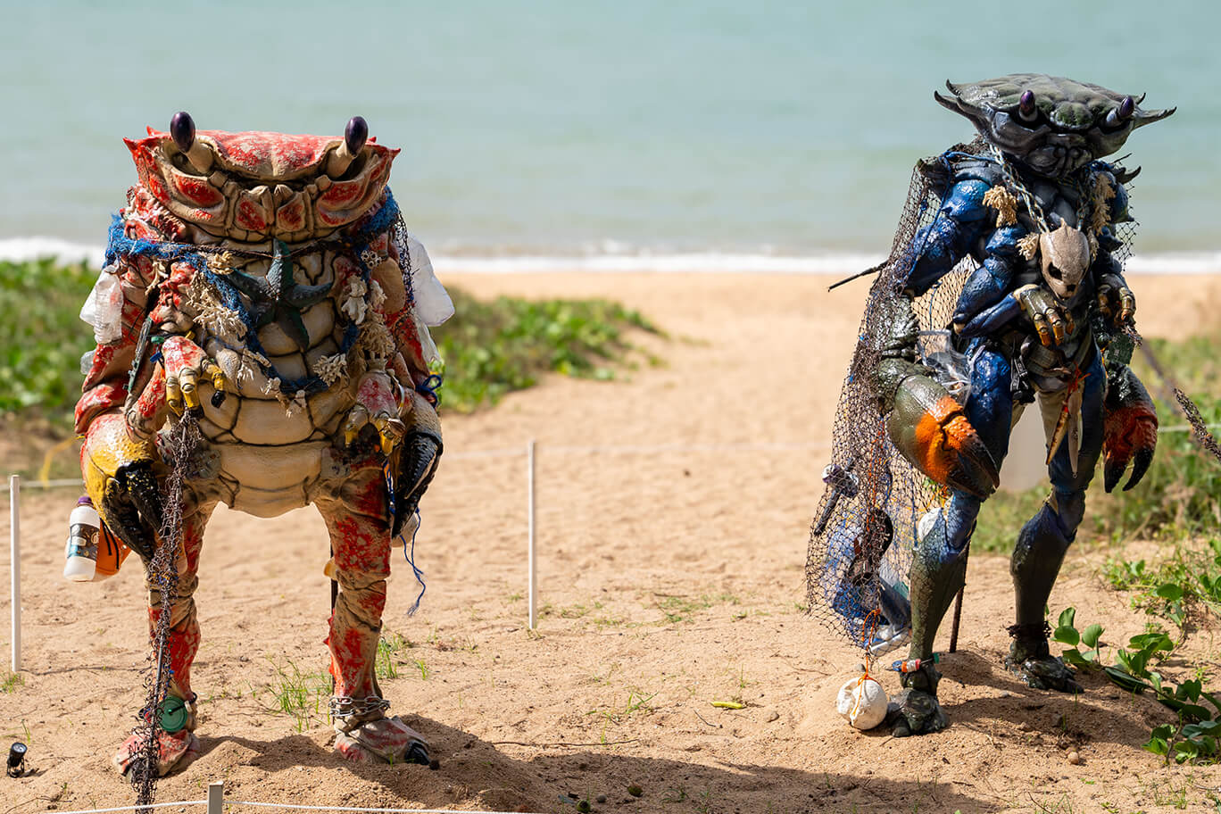 Two towering crab sculptures standing 1.8 metres tall