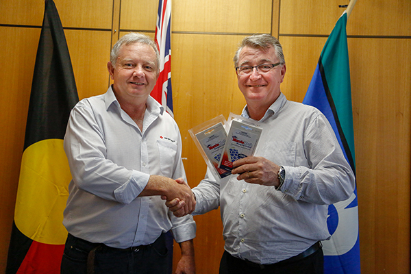 (Left) Charles McClintock from Sumitomo Chemical, Manager Public Health and Professional Products and  (right) Townsville Local Recovery and Resilience Chair, Deputy Mayor Les Walker