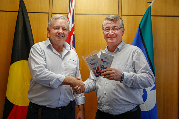 (Left) Charles McClintock from Sumitomo Chemical, Manager Public Health and Professional Products and  (right) Townsville Local Recovery and Resilience Chair, Deputy Mayor Les Walker