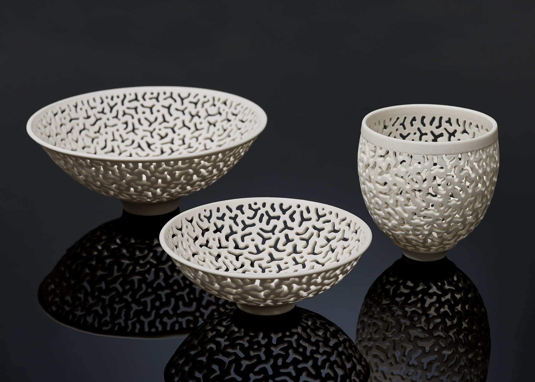 Sandra Black, 3 Etched Bowls, thrown and pieced cool ice porcelain, various sizes. Photograph: Victor France