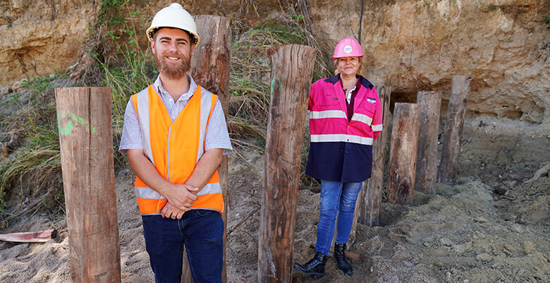 Caption: Townsville City Council's Sustainability Risk Officer Tyson Schmid and Hansen Construction's Jacqui Murr at the site of the timber pile field installation at Black River. Townsville City Council's Sustainability Risk Officer Tyson Schmid and Hansen Construction's Jacqui Murr at the site of the timber pile field installation at Black River