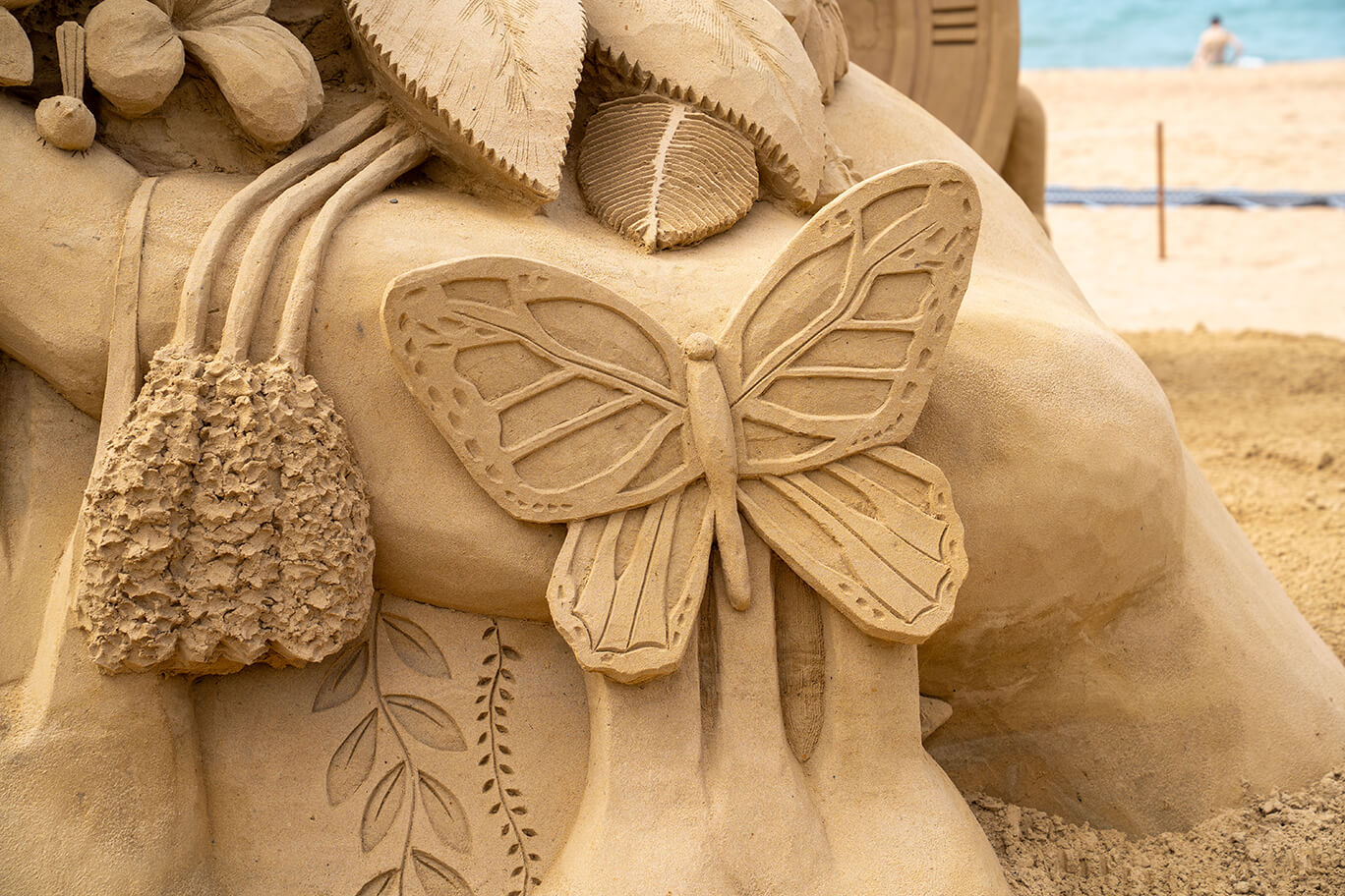 Sand sculpture of a butterfly