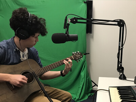 Musician in the Aitkenvale Creative Studio