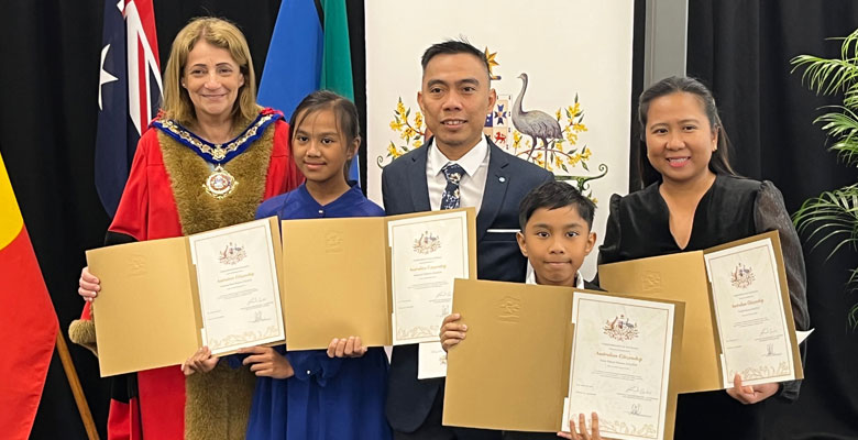 Mayor Jenny Hill with new citizens Immanuel, Noridel, Kate and Ziron Zaldua.