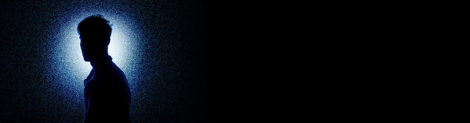 Shadow of man on black background