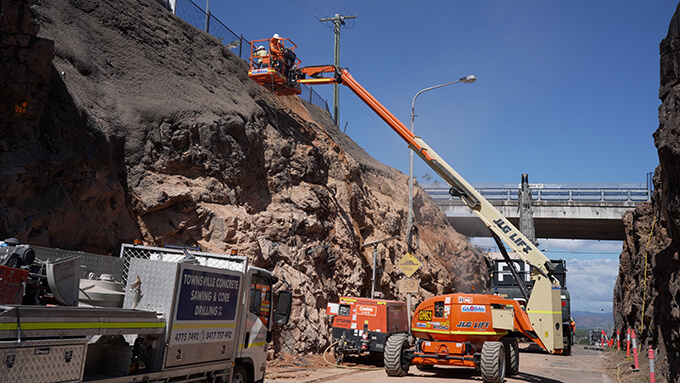 Construction workers in scissor lift