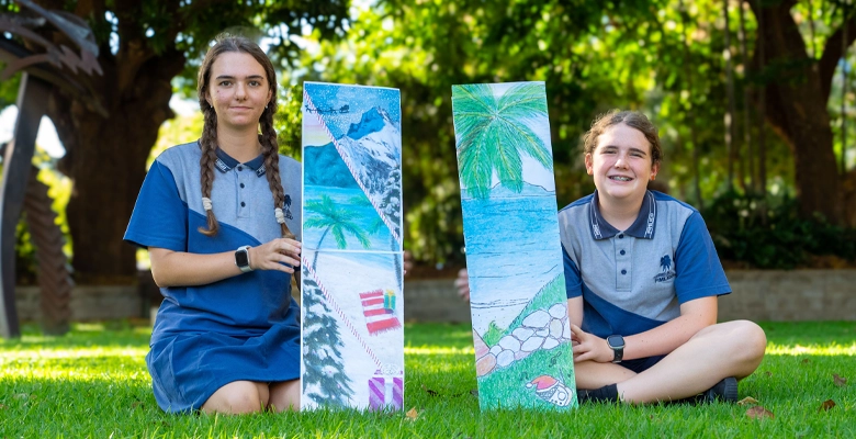 Siblings, Maysen and Kayla Rieniets, with their The Strand-inspired flag designs. Siblings, Maysen and Kayla Rieniets, with their The Strand-inspired flag designs.