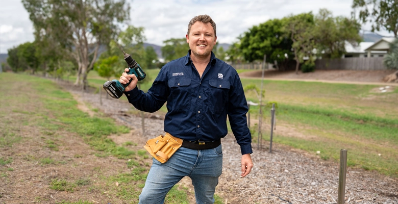 Division 10 councillor Brady Ellis at the site of the soon-to-be constructed timber fence along Lakeside Drive. Division 10 councillor Brady Ellis at the site of the soon-to-be constructed timber fence along Lakeside Drive.