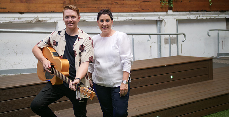 Musician Tony Wood, pictured with Cr Ann-Maree Greaney, will perform at the first Music in the City at Flinders Lane this Friday. 