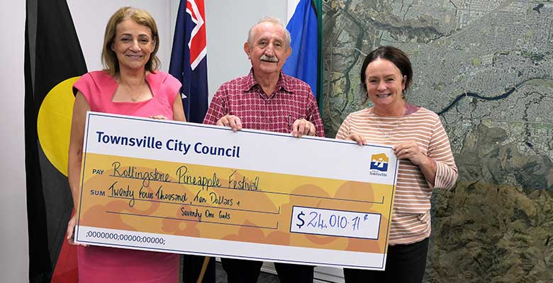 Townsville Mayor Jenny Hill and Cr Margie Ryder with John Muller from the Rollingstone Pineapple Festival