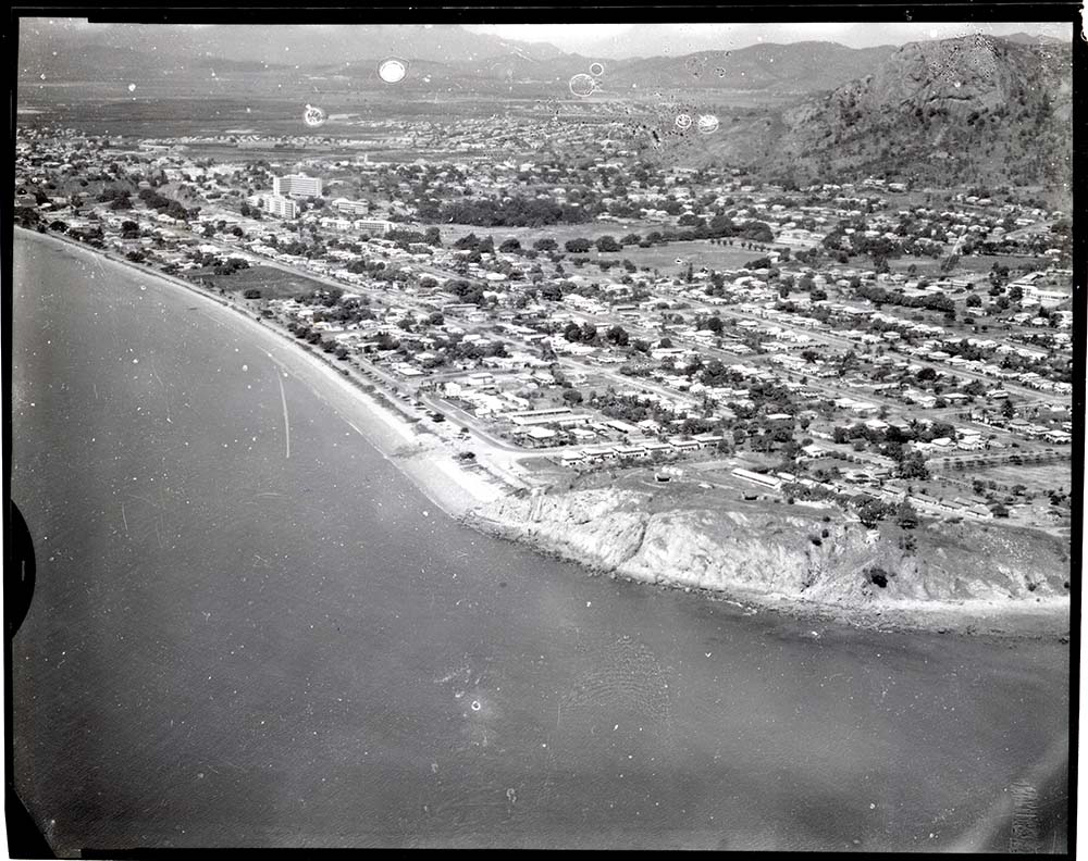 Kissing Point, the Strand and the suburb of North Ward, aerial view, 1968