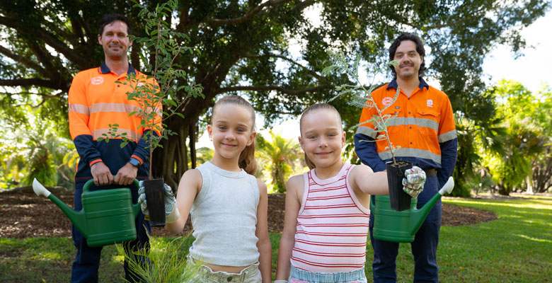 Layla and Charli Ryder with TCC Environment team members Nathan Gallagher and Matthew Greer, getting ready for Saturday's community planting day Layla and Charli Ryder with TCC Environment team members Nathan Gallagher and Matthew Greer, getting ready for Saturday's community planting day