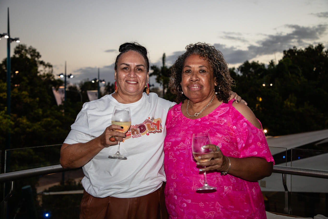 Two women holding glasses of wine at Horizon - 2026 Theatre Season